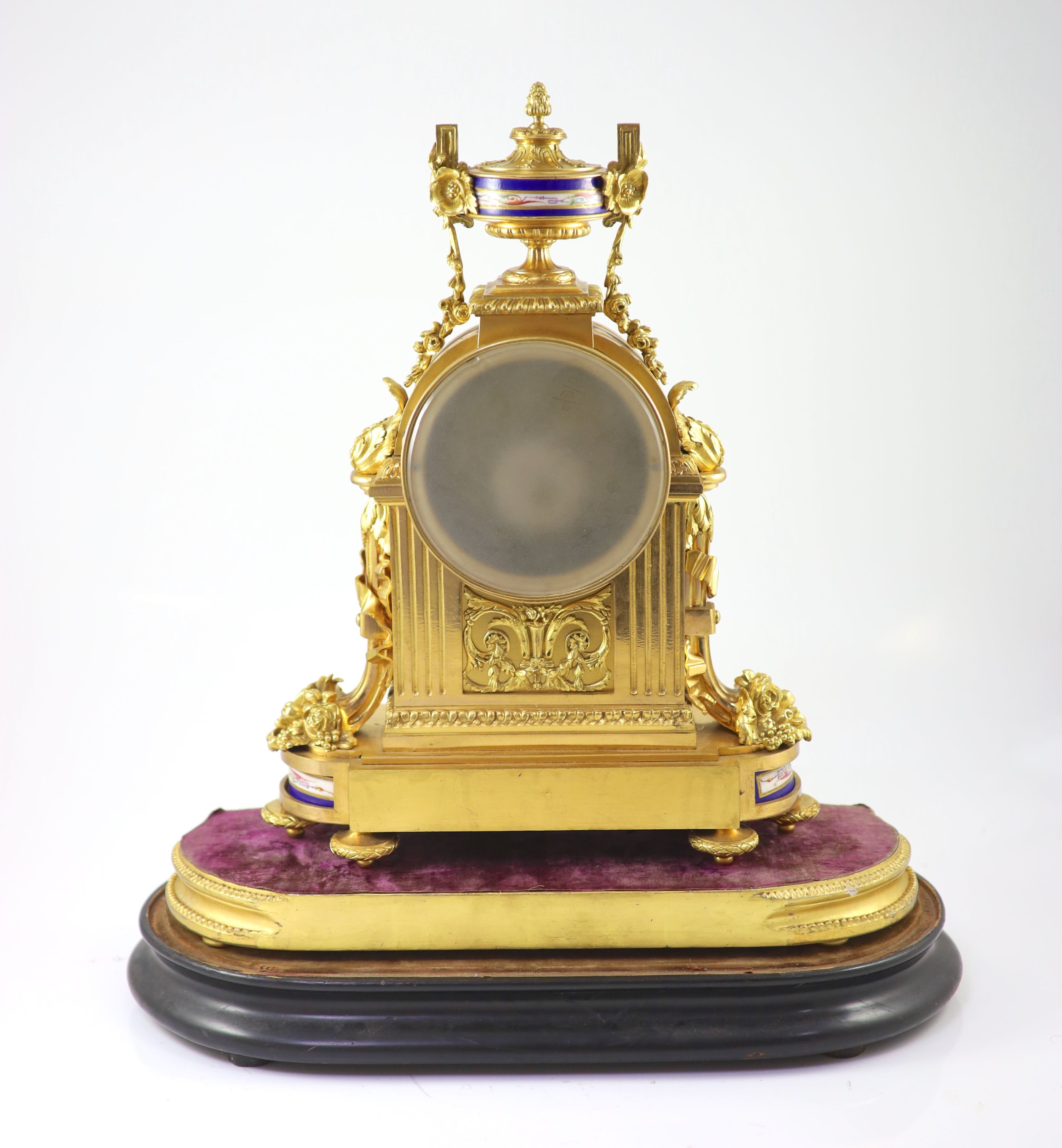 A 19th century French ormolu and Sevres style porcelain mantel clock H 46cm. W 35cm. D 16cm.